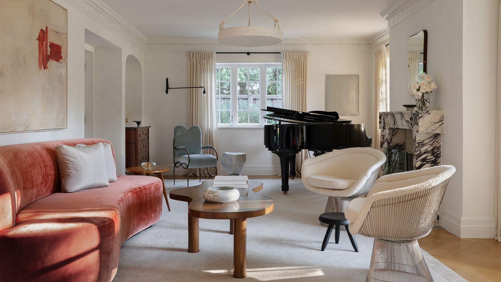 Image may contain keyboard, musical instrument, piano, chair, furniture, home decor, lamp, table, coffee table and indoor