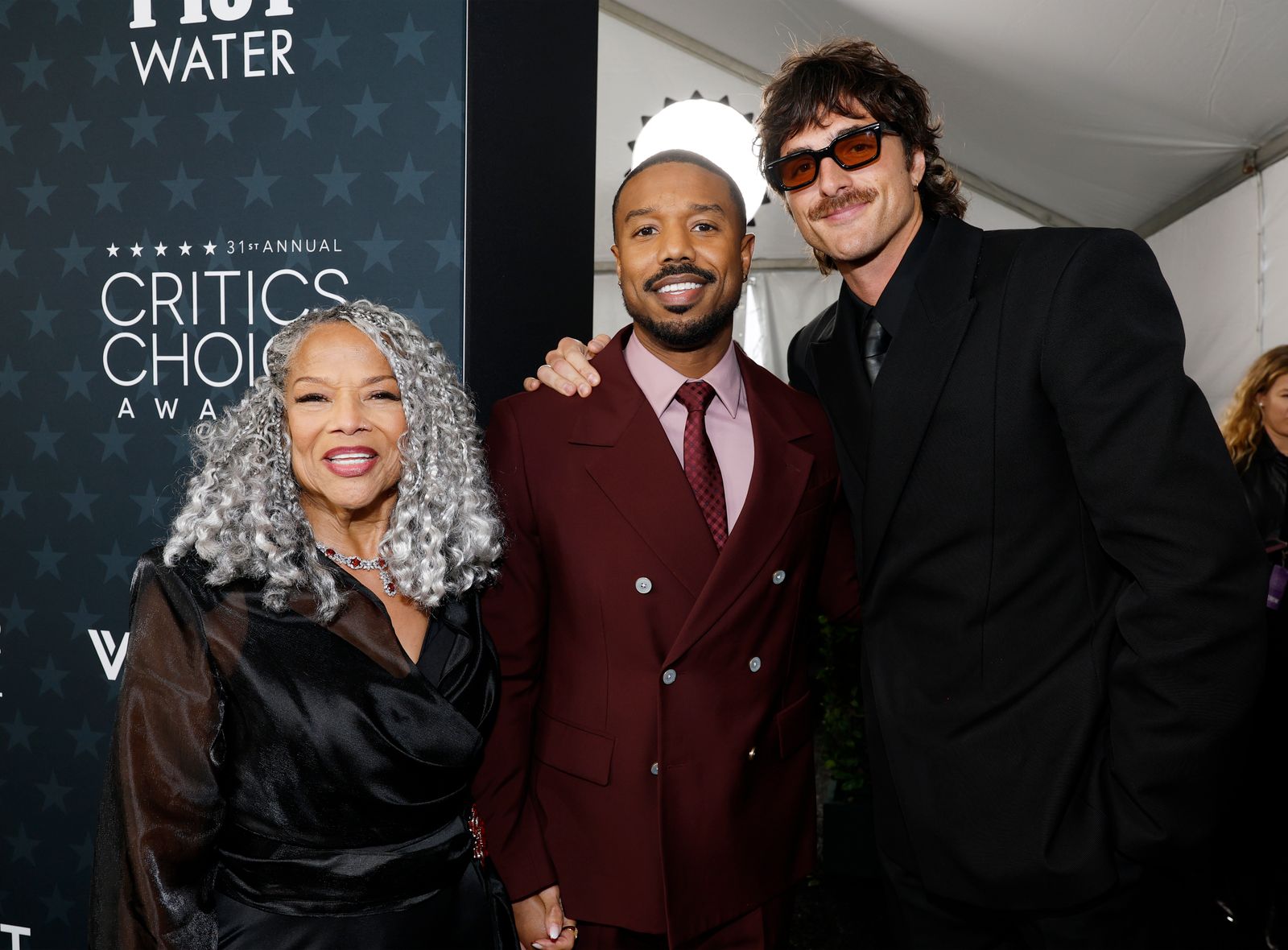 Image may contain Christiane Taubira Michael B. Jordan blazer, clothing, outerwear, accessories, sunglasses and people