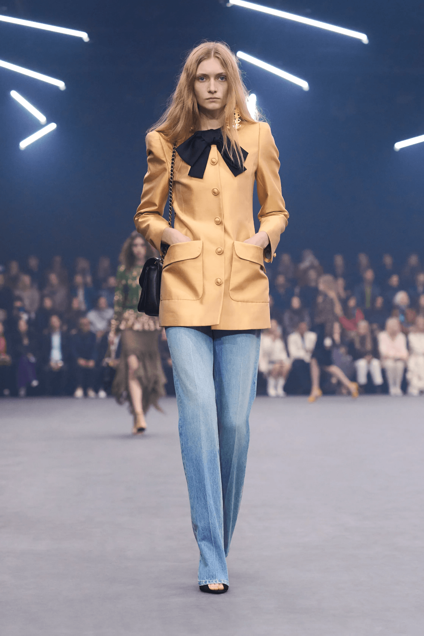 Image may contain La Parka Ishmaa'ily Kitchen Billy Joe DuPree Fashion Clothing Jackets Jeans Pants Adults and Personals