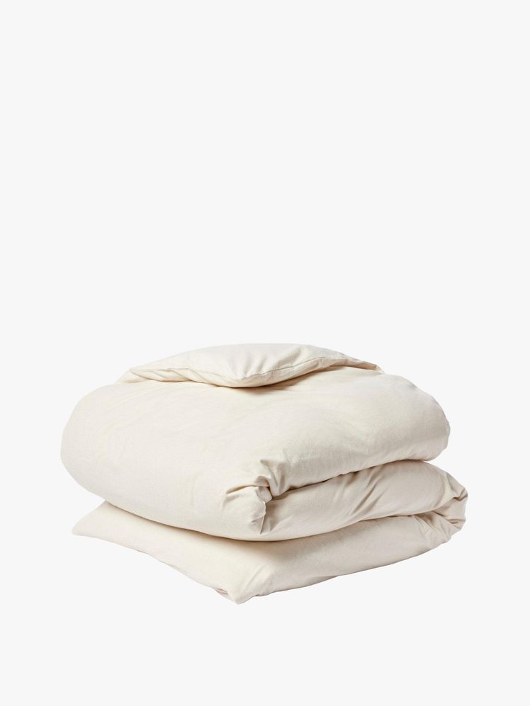 Image may contain: cushion, home decor, pillow and blanket