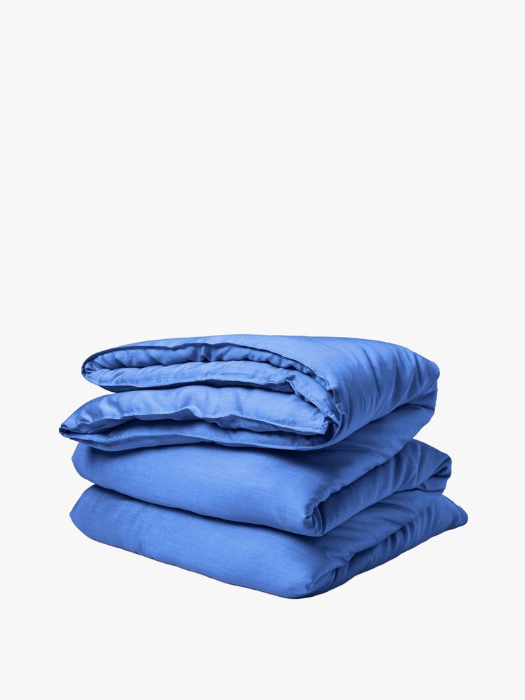 Image may contain: cushion, home decor, blanket, pillow and diaper