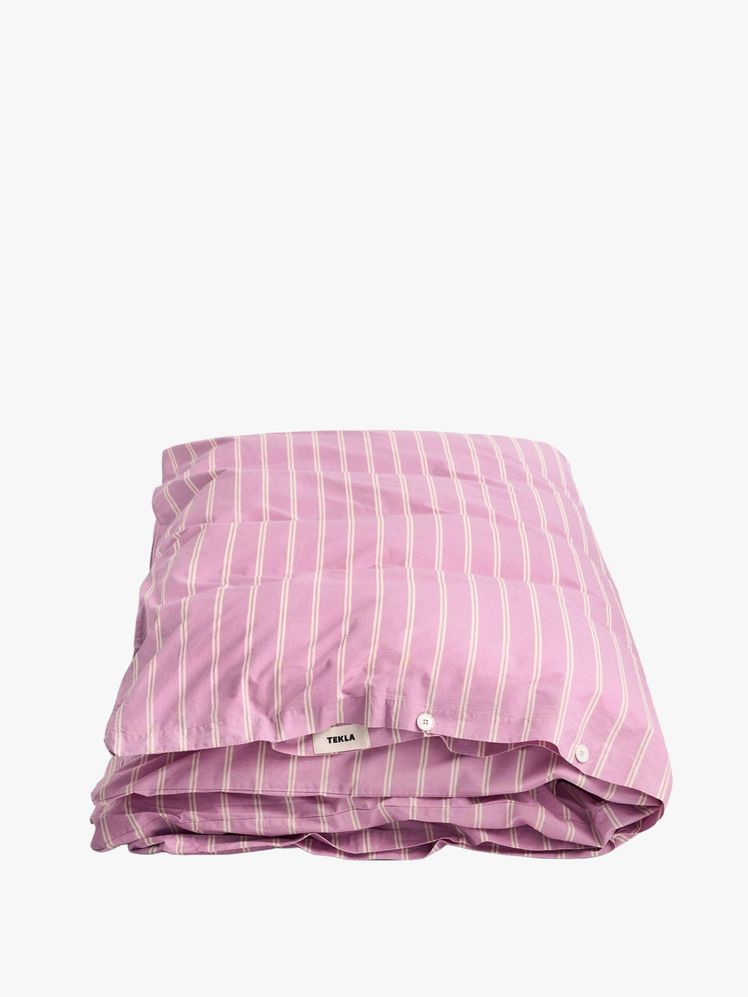 Image may contain: cushion, home decor, blanket and pillow