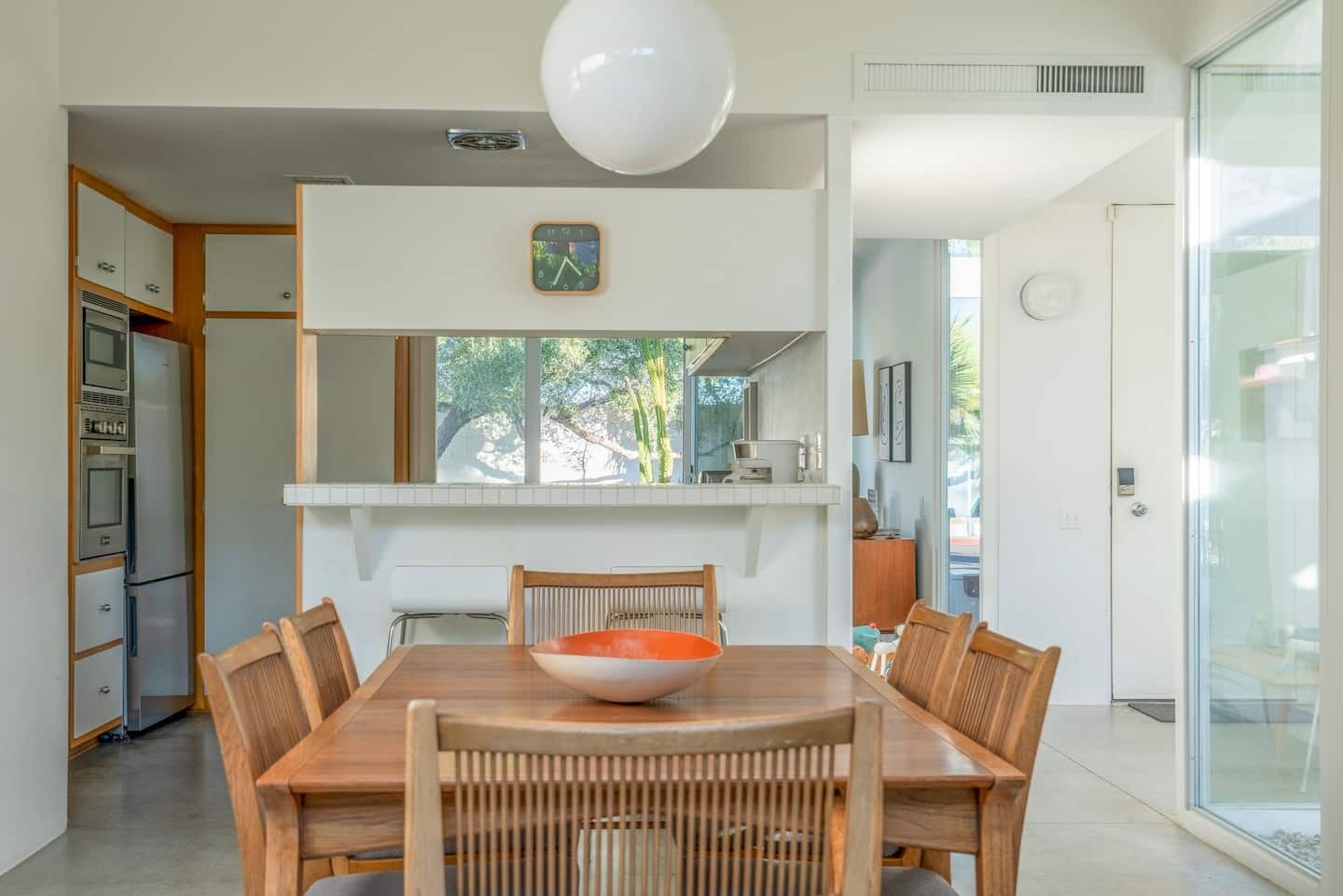 Image may contain architecture, architecture, restaurant, dining table, furniture, indoor table and tabletop