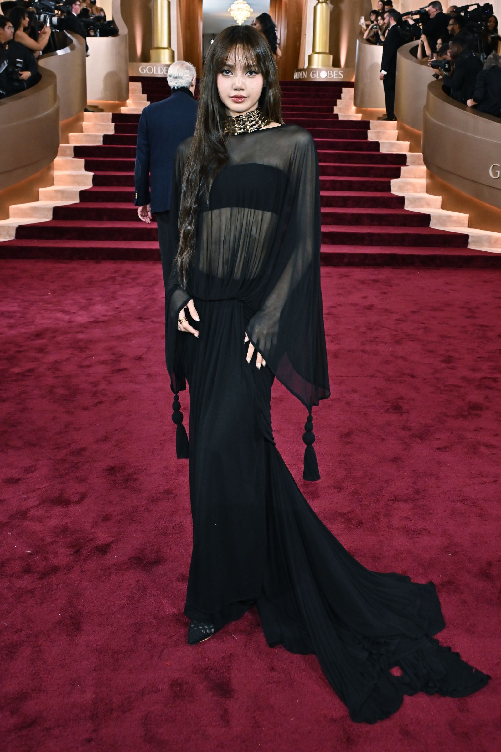 Images may contain fashionable adult apparel, outerwear, accessories, jewelry, necklaces, premieres and red carpets