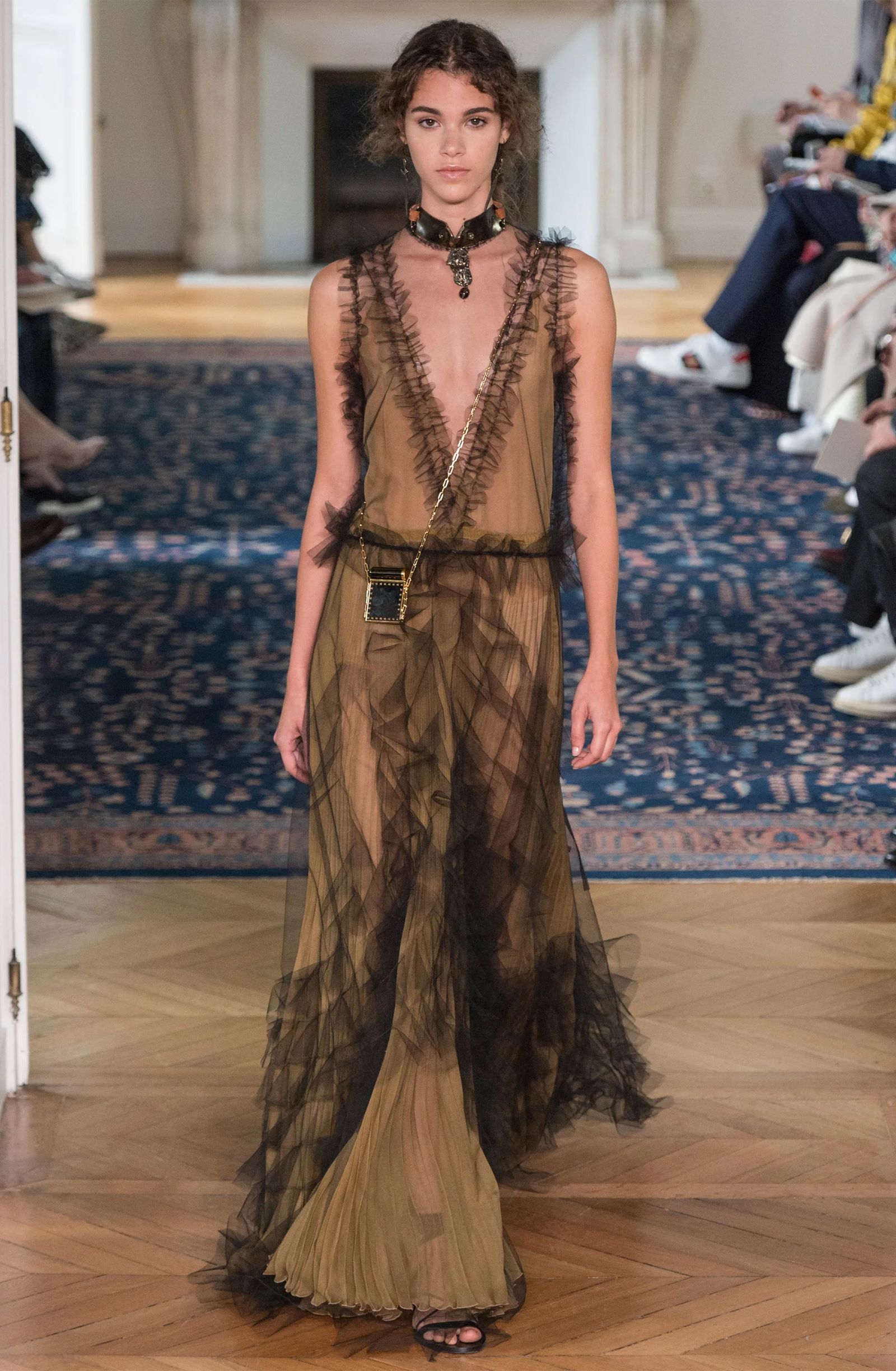 Image may contain people, adult clothing, dresses, fashion, formal wear, footwear and shoes