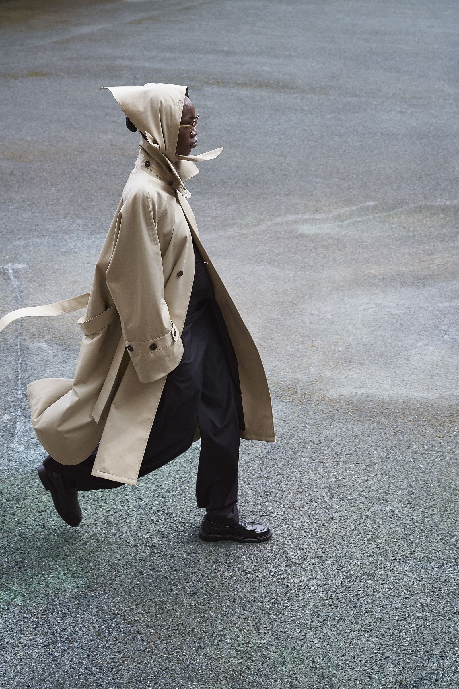 Image may contain clothing, outerwear, footwear, adults, coats, accessories and eyewear