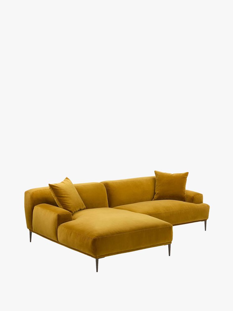 Image may contain: sofa, furniture, cushions and home decor