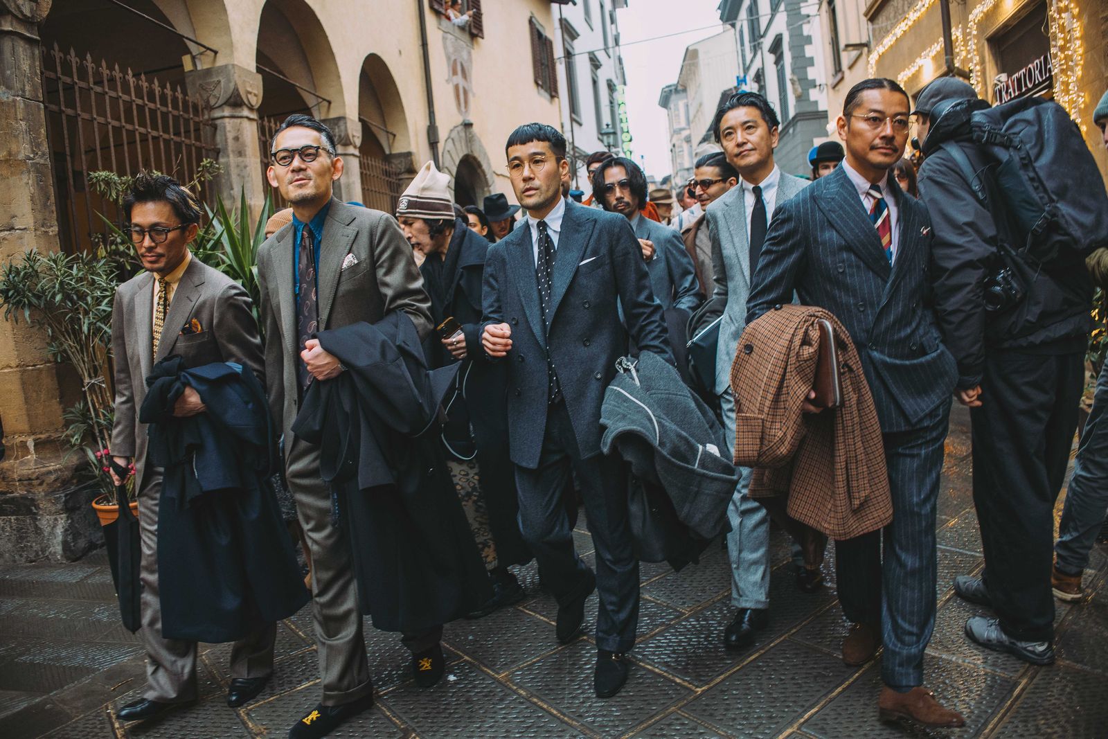 Image may contain Kow Otani Mr. Fuji Blazer Clothing Coat Jacket People Adult Footwear Shoe Face and Head