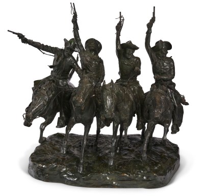 A bronze sculpture shows four cowboys on horseback, pointing their pistols into the air as they gallop forward
