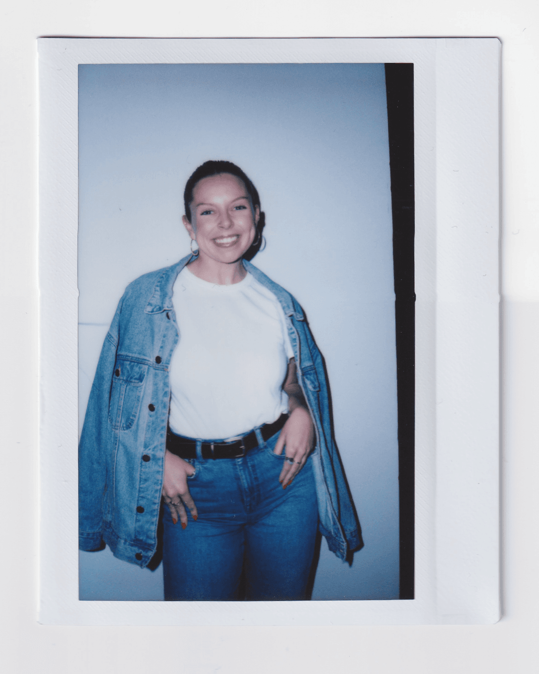 Image may contain clothing, pants, jeans, long sleeves, sleeves, face, happy head, people, smiling shirt and adult