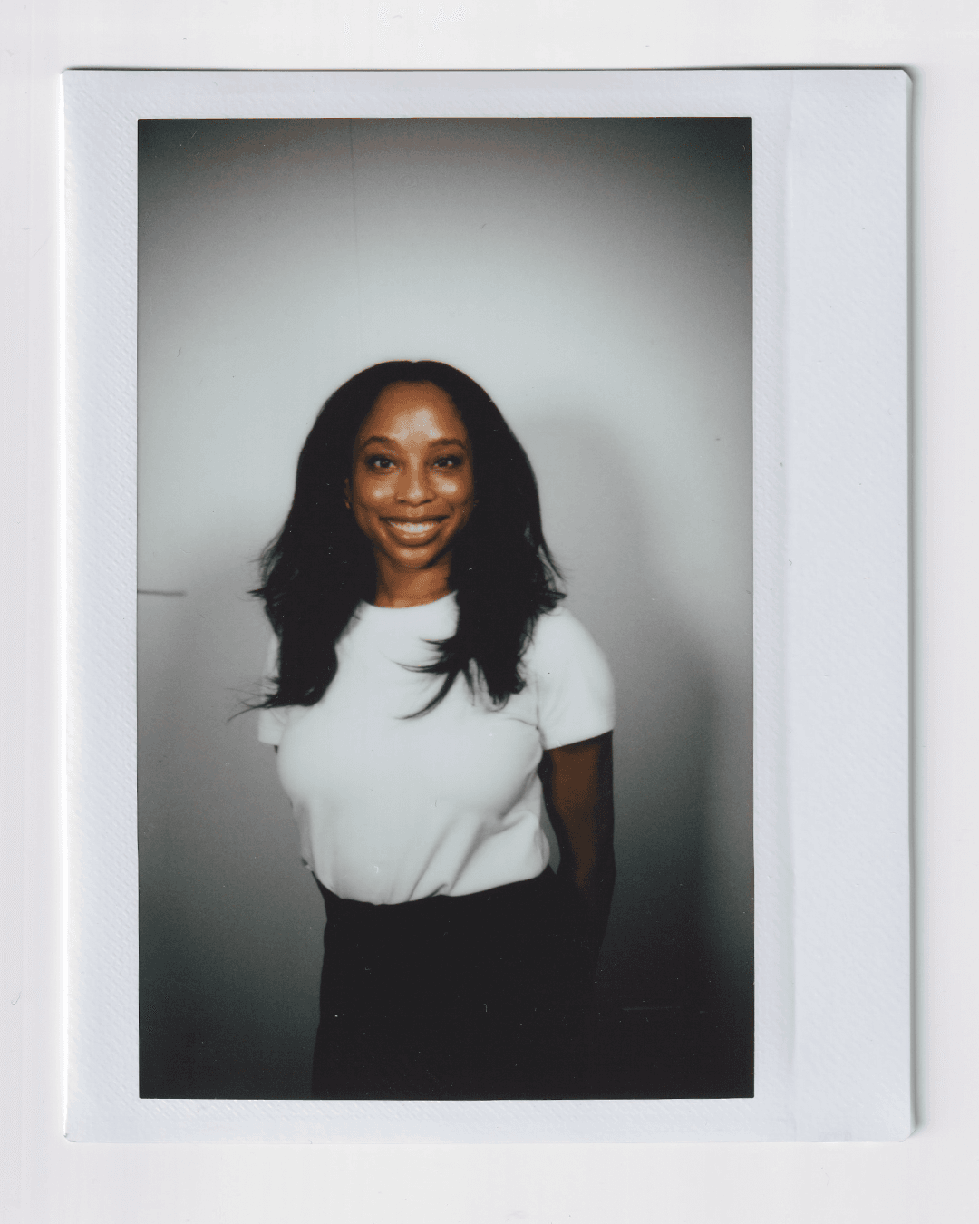 Image may contain face, head, people photography, portrait, shirt, clothing, happy smile, long sleeves and sleeves