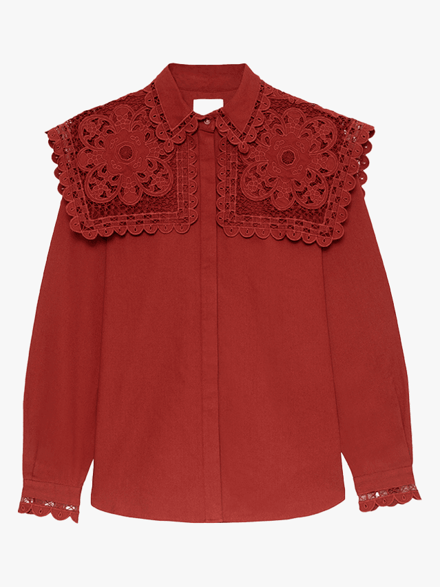 Image may contain: shirt, clothes, long sleeves and sleeves