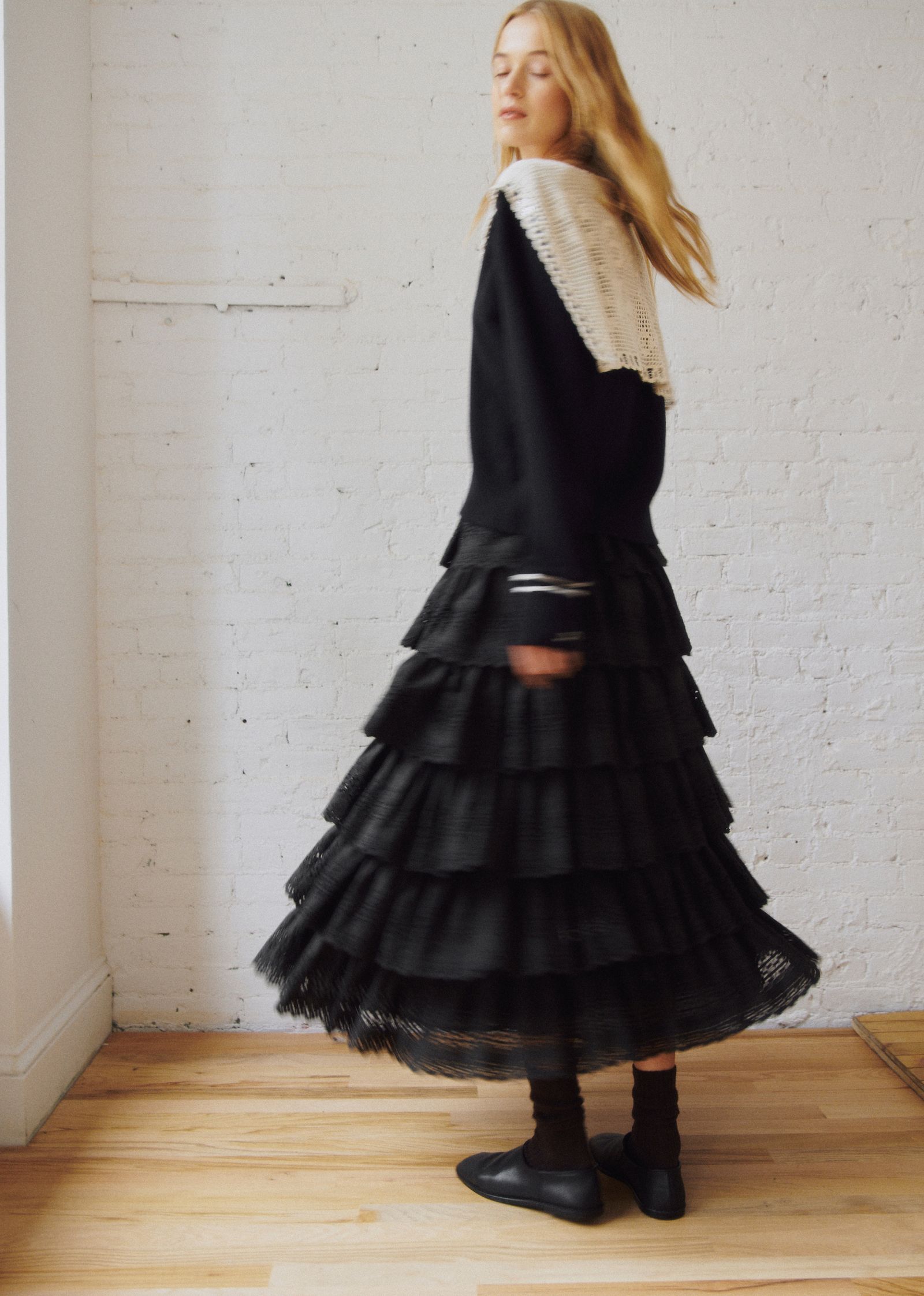 Image may contain Leonie Wesselow Clothing Dresses Cape Fashion Adult Long Sleeve Sleeves Formal Clothing and Coats