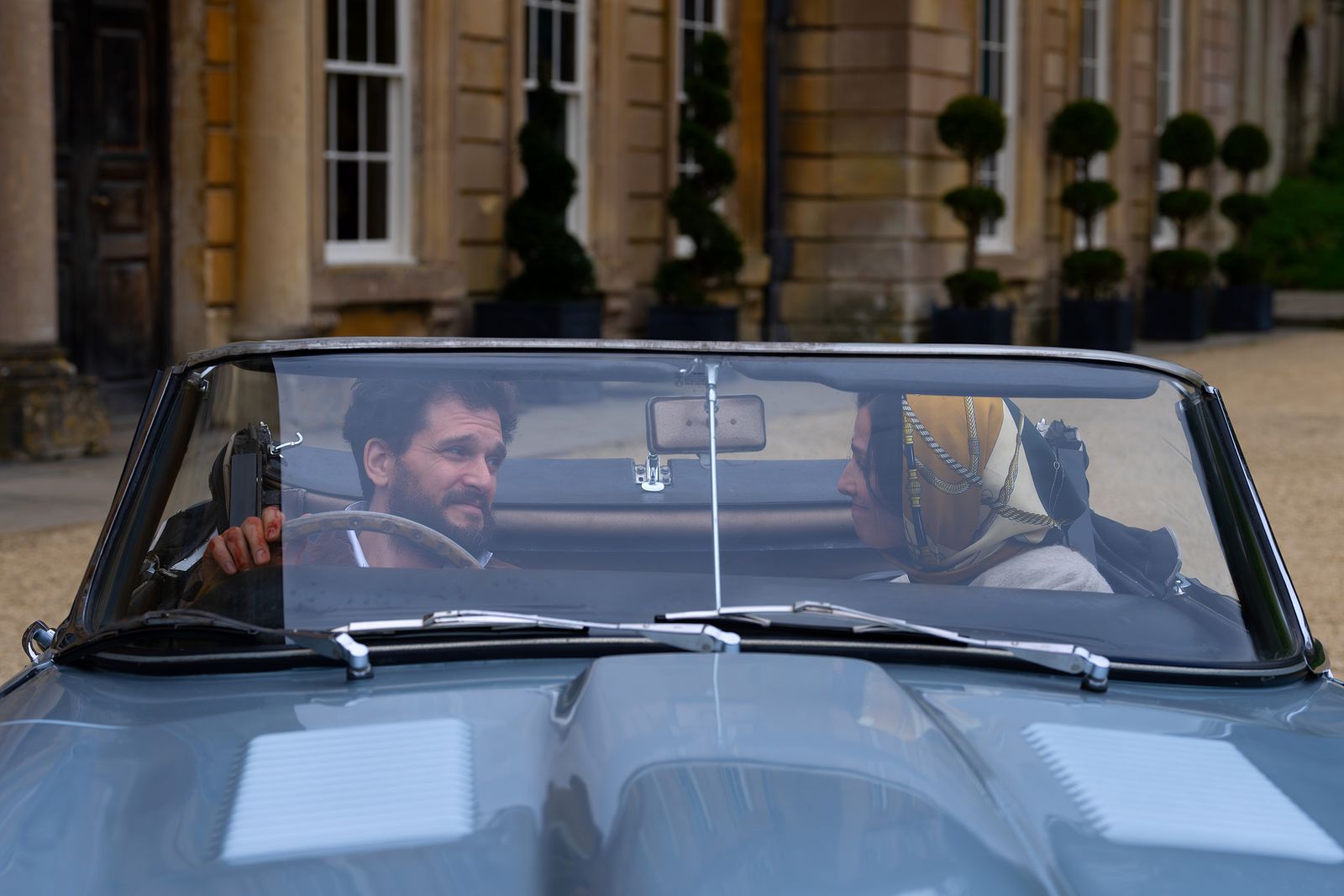 Image may contain Kit Harington Plant adult car transport vehicle and windshield