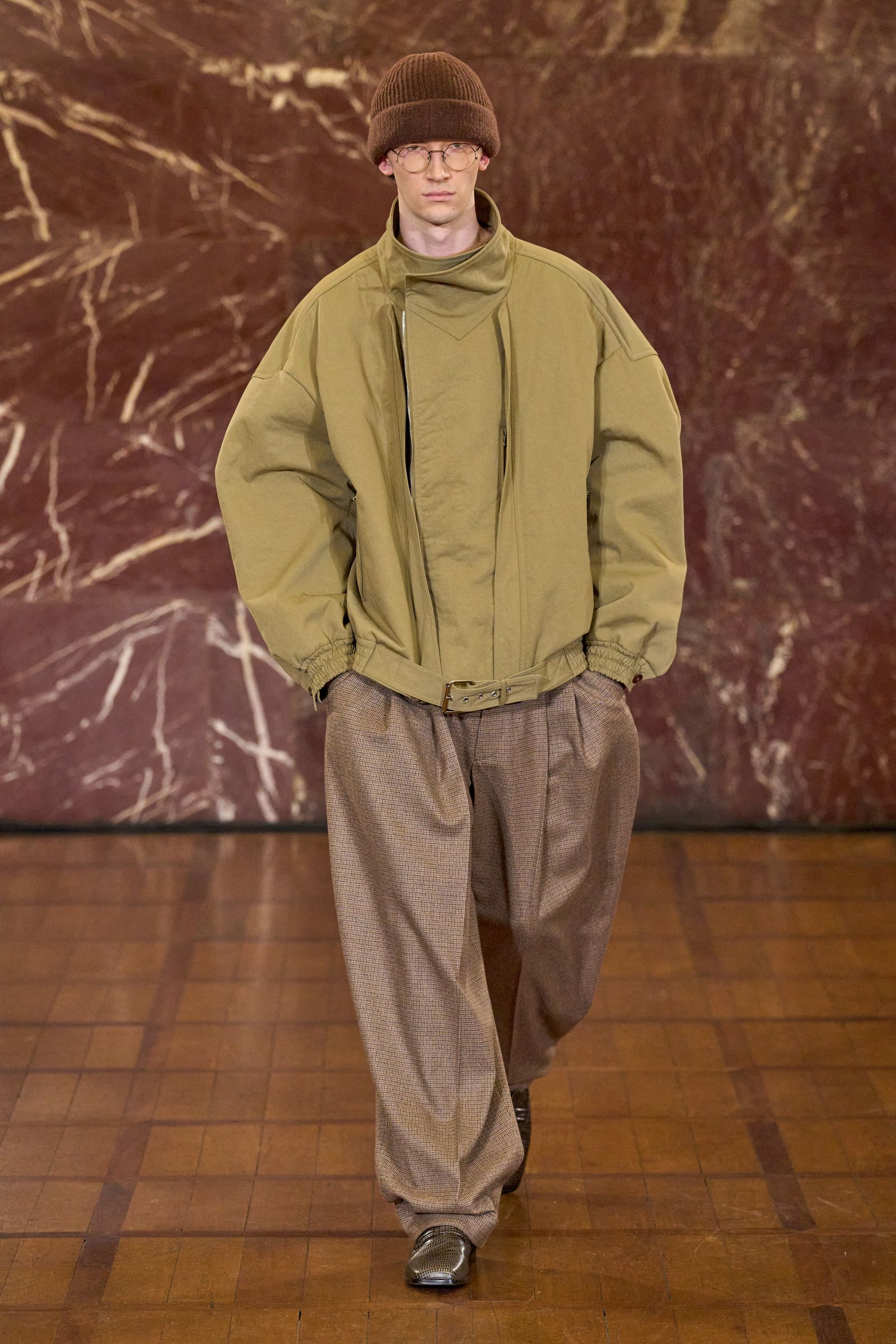 Image may contain clothing, coats, jackets, fashion adults and people