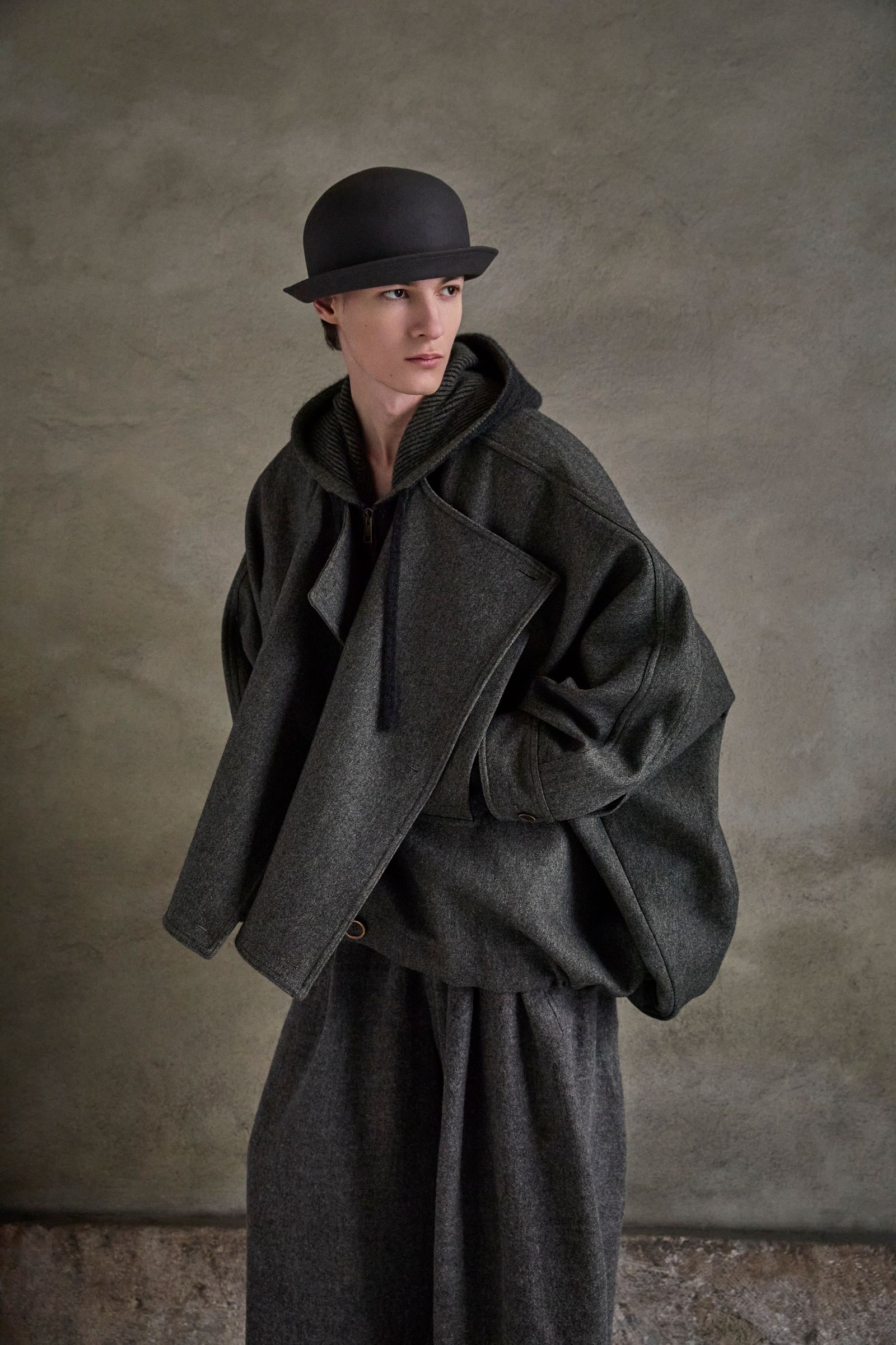 Image may contain clothing, outerwear, coats, fashion and people