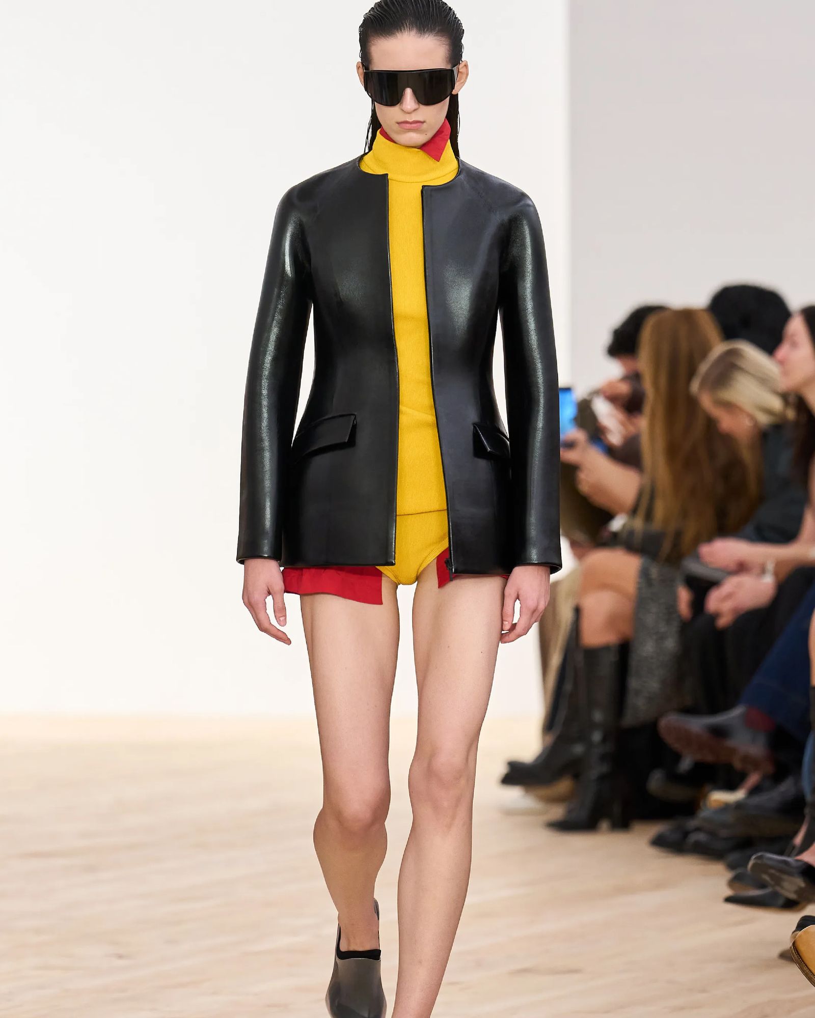 Pictures may contain clothing, coats, long sleeves, sleeve jackets, adult formal suits, fashion and shorts