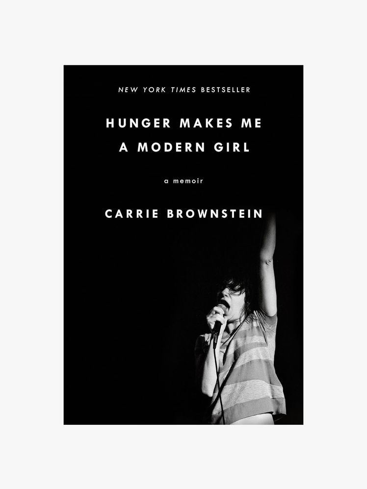 Image may contain: Clothing, T-Shirt, Face, Head, Person, Photography, Portrait, Book, Publication, Advertisement, and Poster