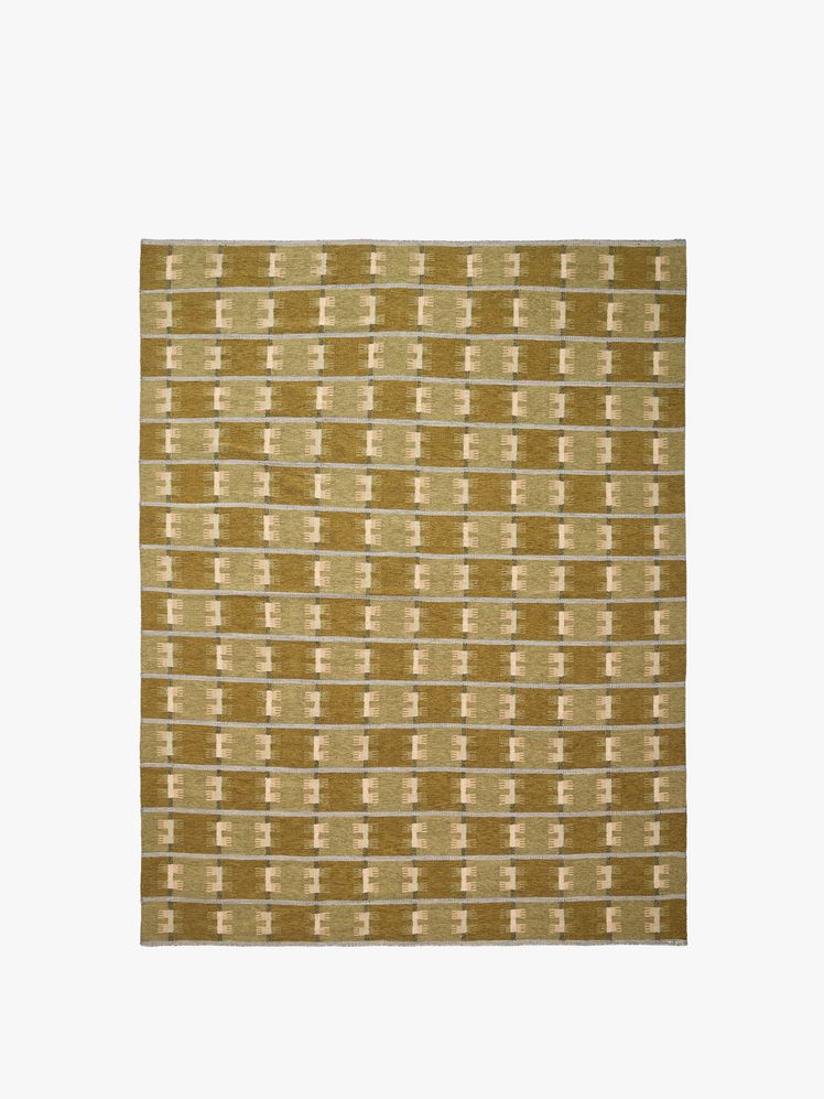 Image may contain: home decor, rug and knitting