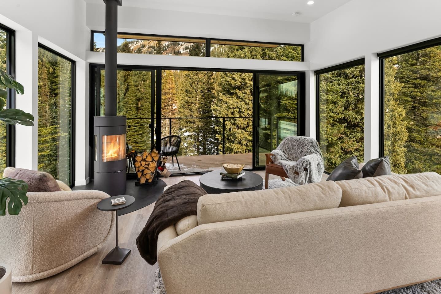 Image may contain chairs, furniture, interior design, sofa, table, windows and french windows