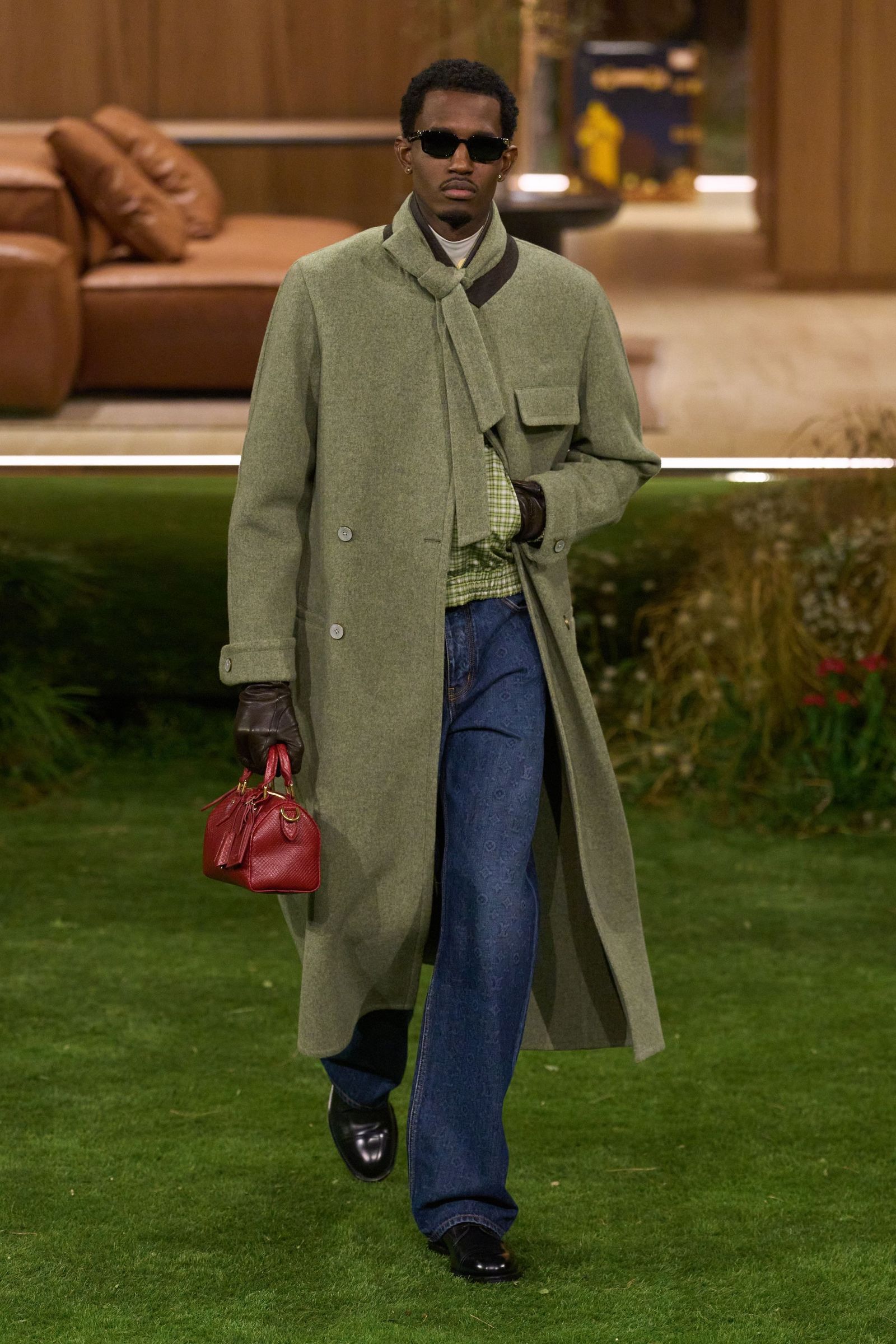 Image may contain clothing jackets and coats