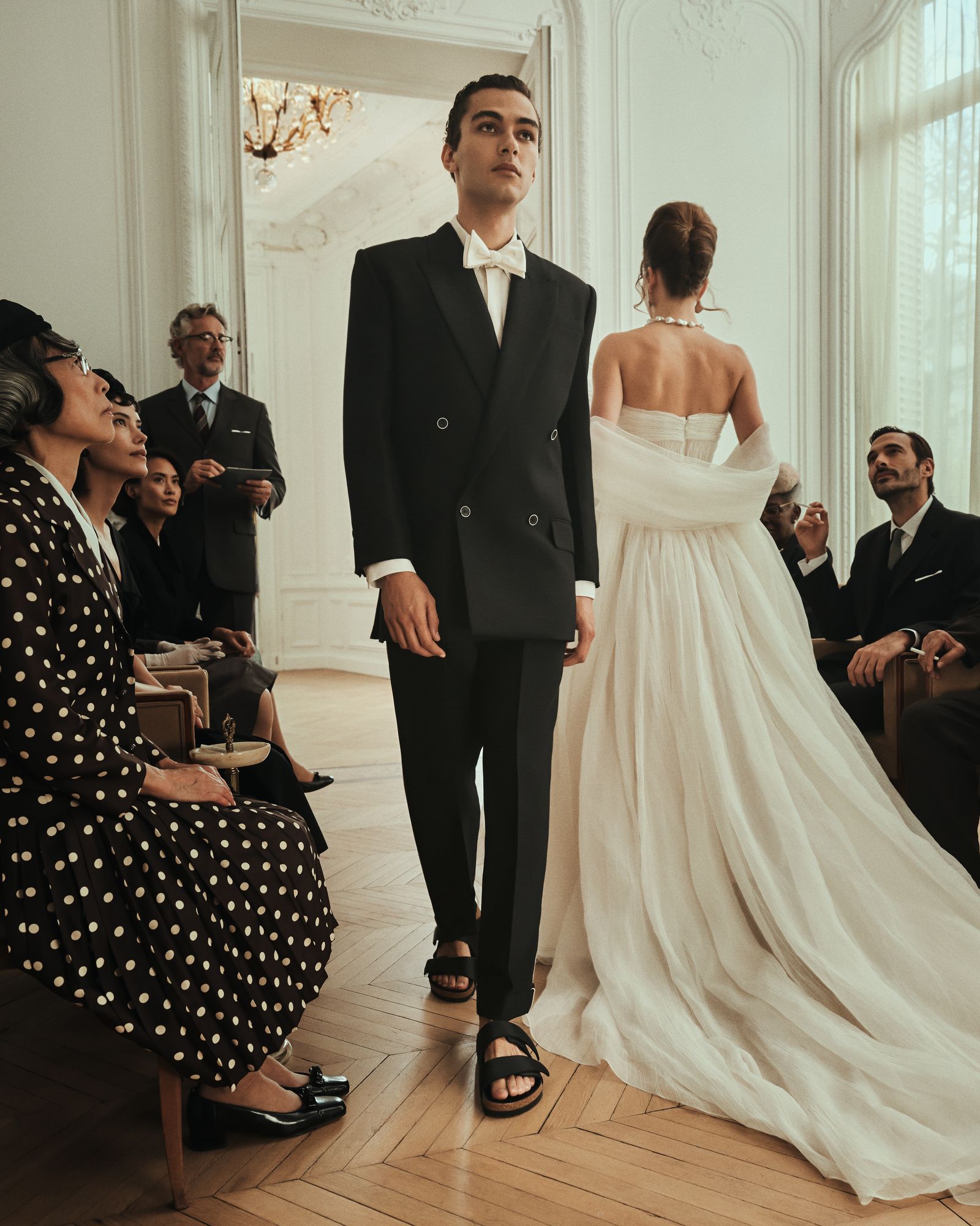 Image may contain Igor Vamos Michel Leclerc Adult Wedding Outfits Footwear Sandals Formal Wear and Suits