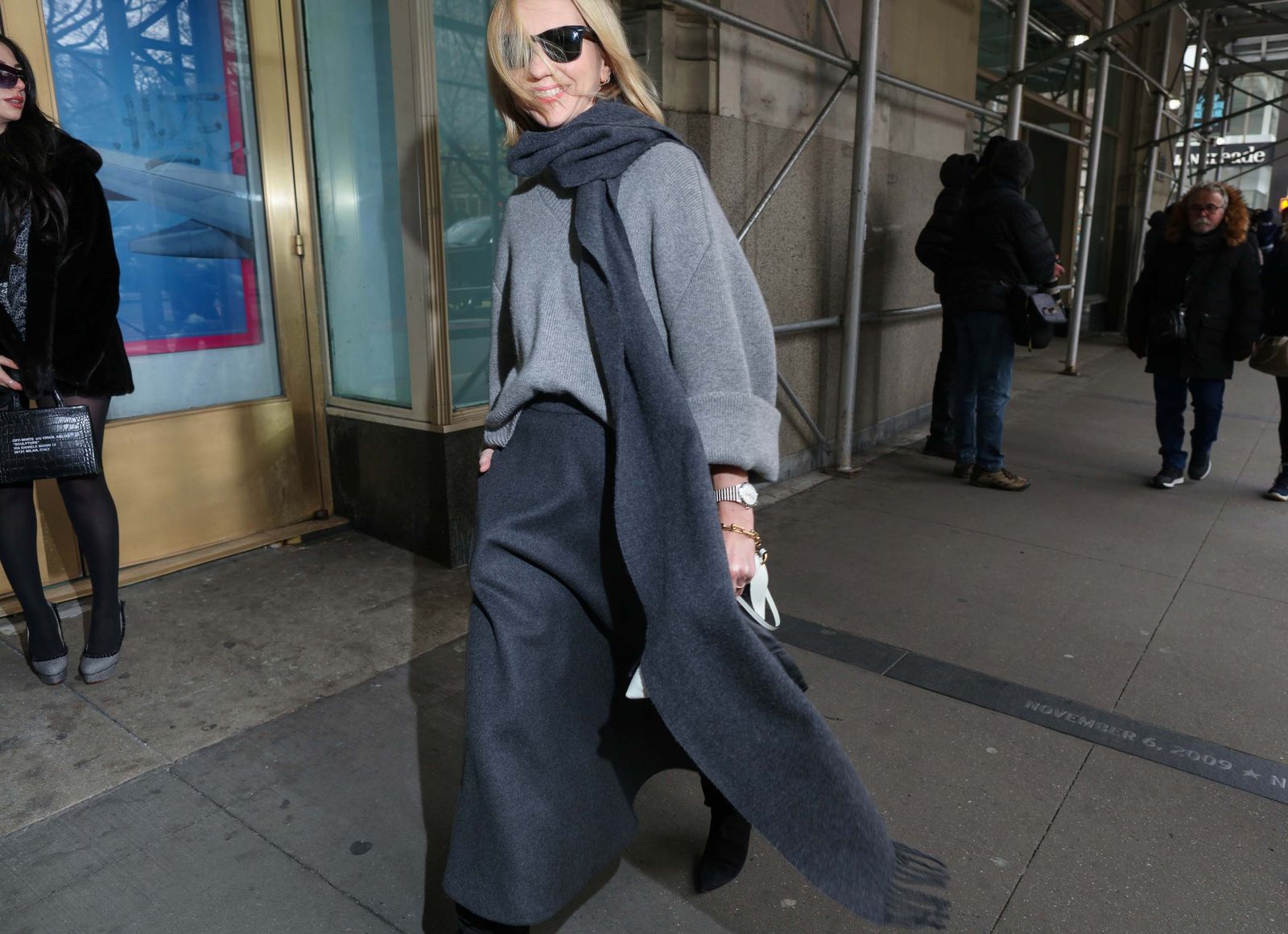 Image may contain Phil Kaufman clothing, outerwear, accessories, bags, totes, adults, coats, watches and shoes