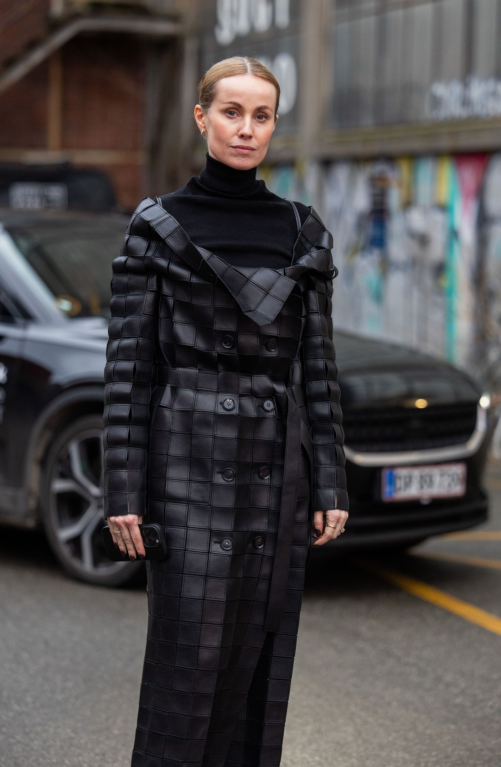 Image may contain Sofia Helin Clothing Coats People Adult Coats Auto Transport and Vehicles