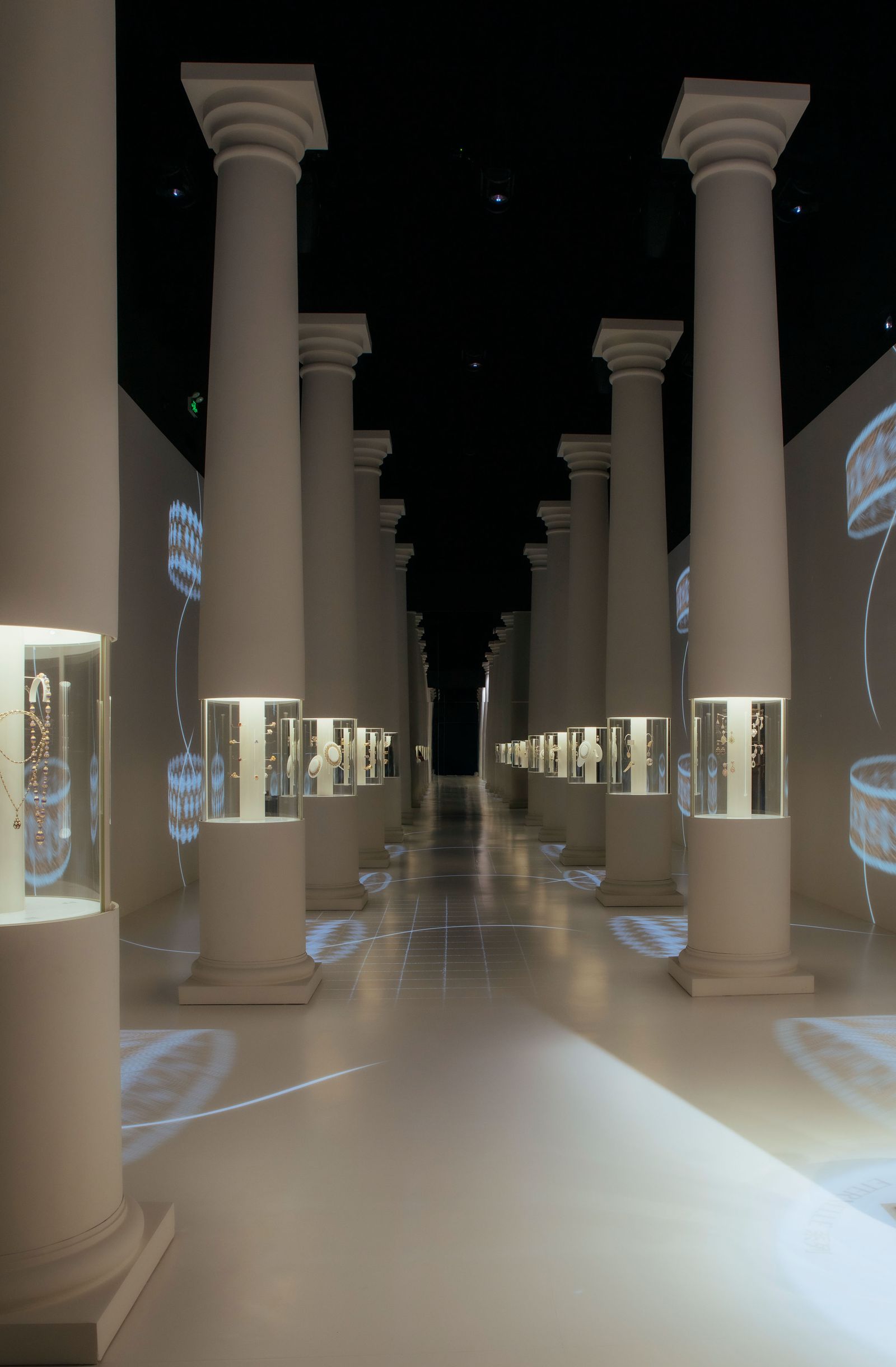 Image may contain architecture interior city floors corridor city pillars people and museum