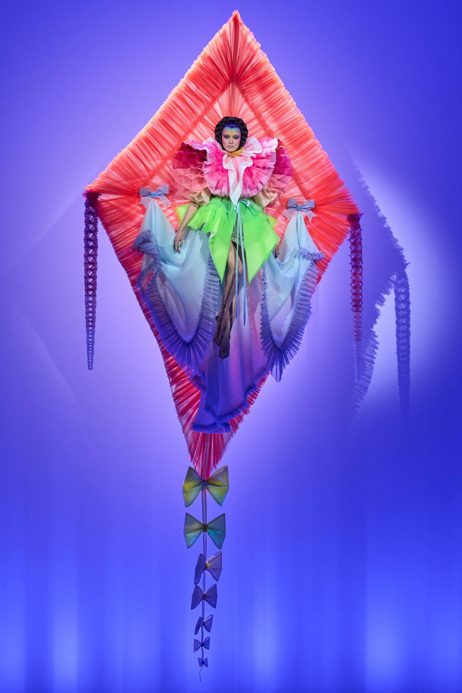 Image may contain toy kite adult wedding face and head