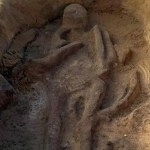 A gray corpse in the pit.