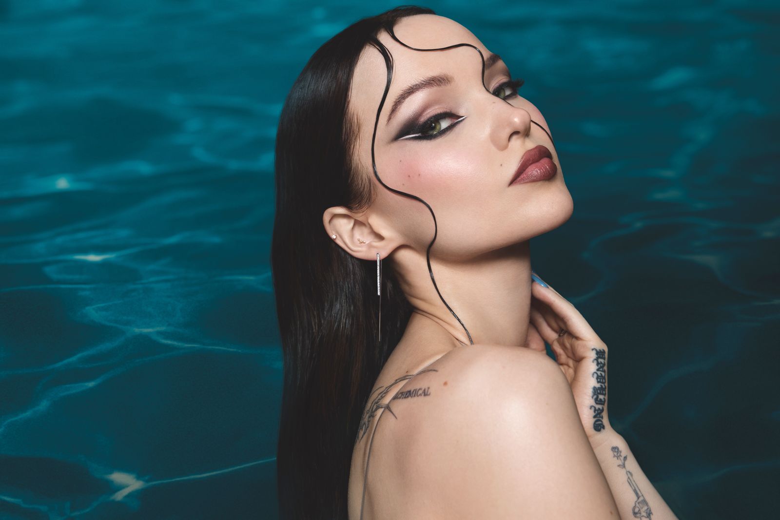 Images may contain Dove Cameron body parts, face, head, neck, adult photography and portraits