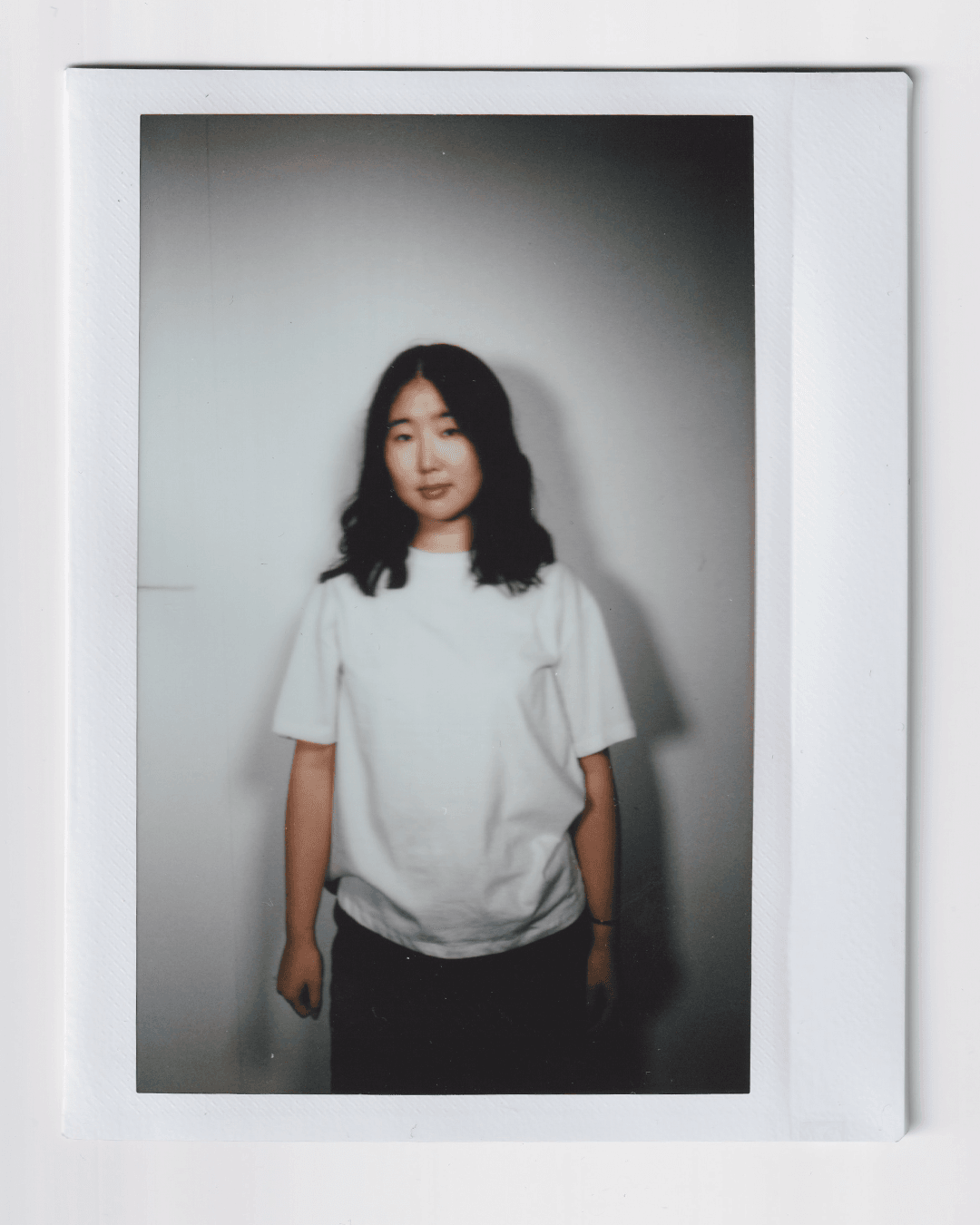 Image may contain shirts, apparel, t-shirts, long sleeves, sleeves, faces, heads, people photography, portraits and adults