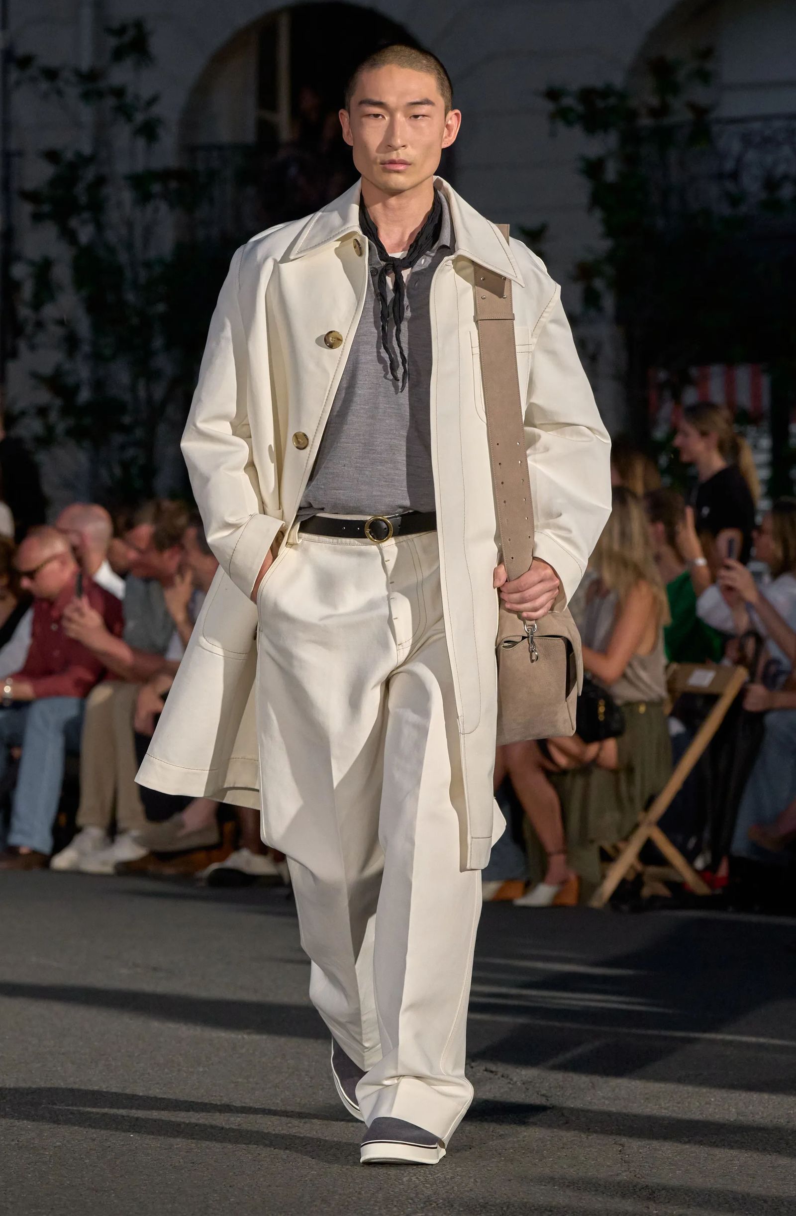 Images may contain La Parka clothing, outerwear, adult accessories, bags, handbags, coats, eyewear, footwear and shoes