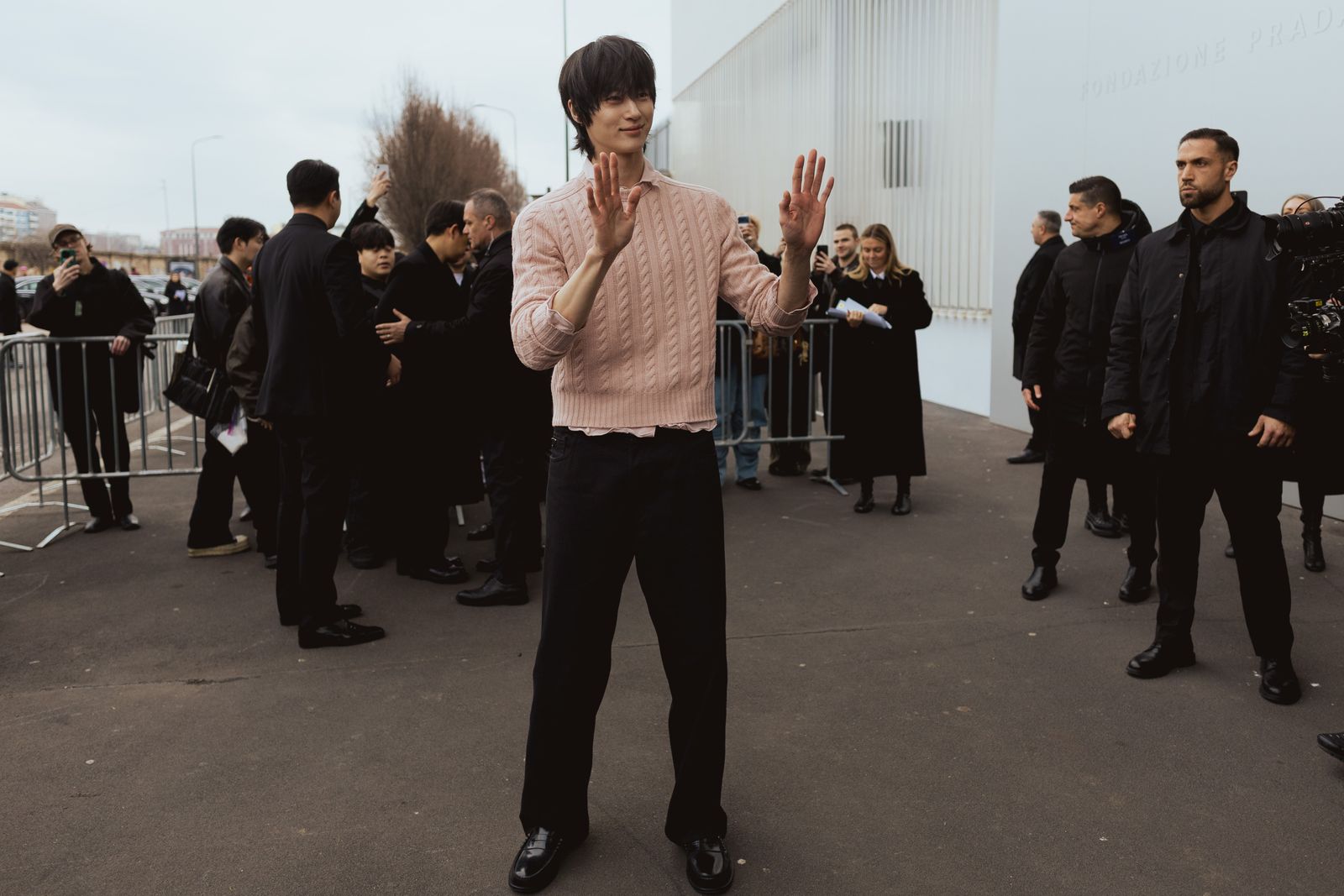 Image may contain Kim Sungkyu Nan Cunhui Adult clothing knitwear and sweaters