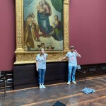 Two people from climate protest group Letzte Generation glue their hands to the painting's golden frame "Sistine Madonna" Exhibited in August 2022 at the Old Masters Gallery in Dresden. They were later convicted of property damage.