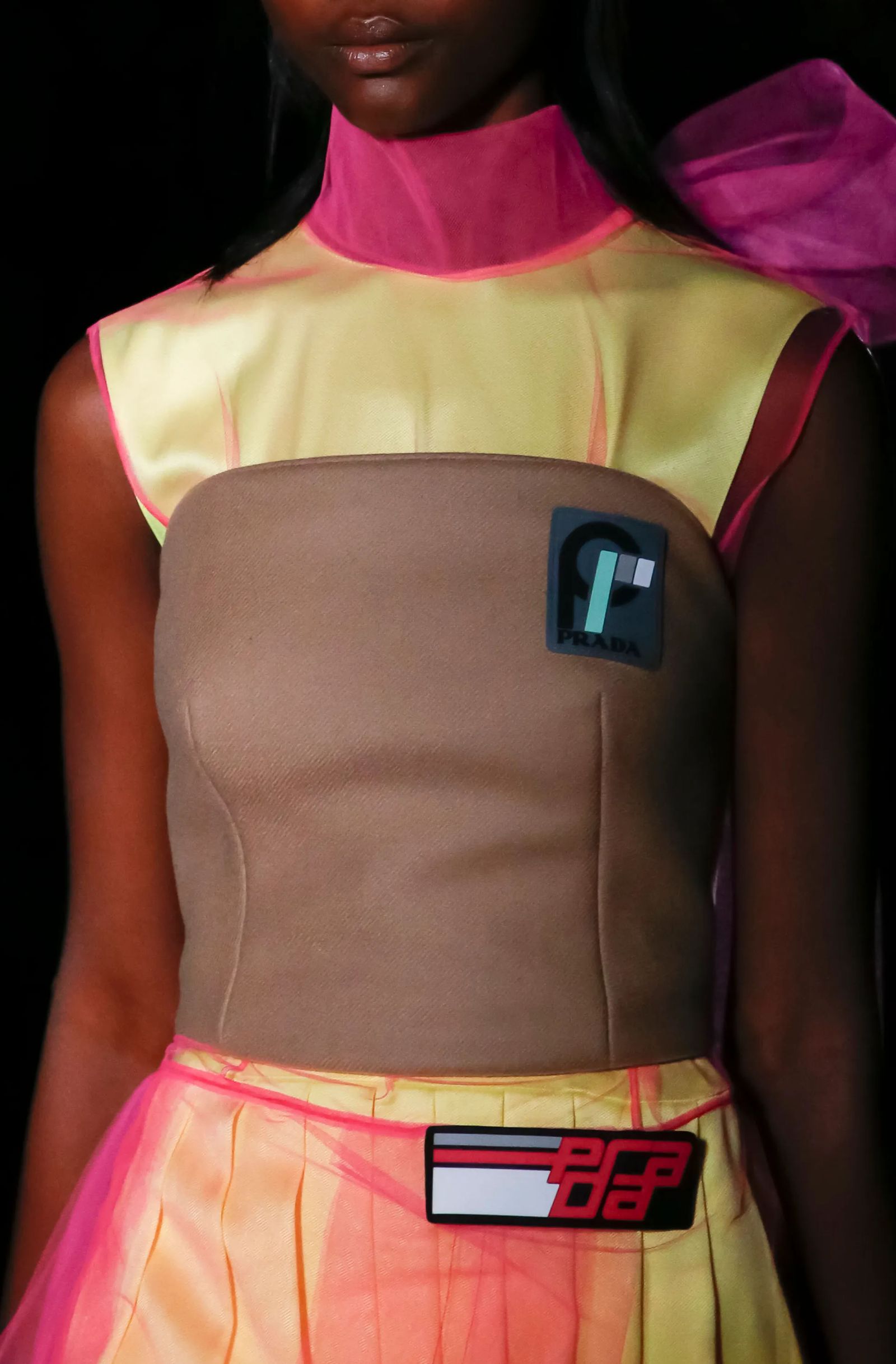 Image may contain shirts, clothing, people, life jackets, vests, faces and heads