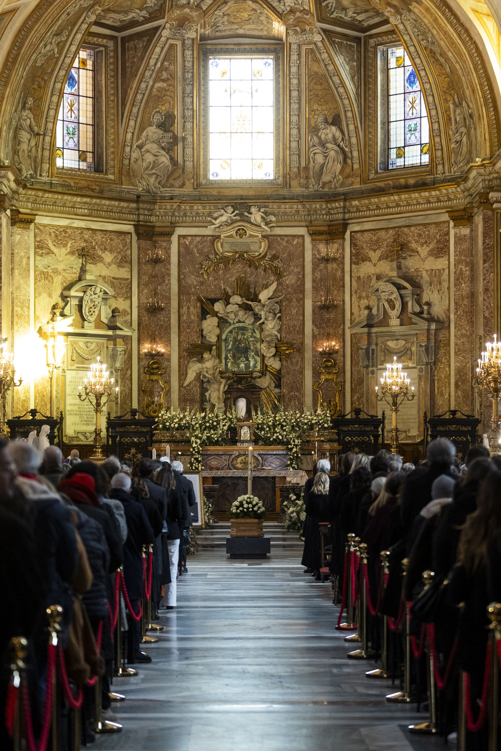 Image may contain altar building, church prayer room, adult church accessories and bags