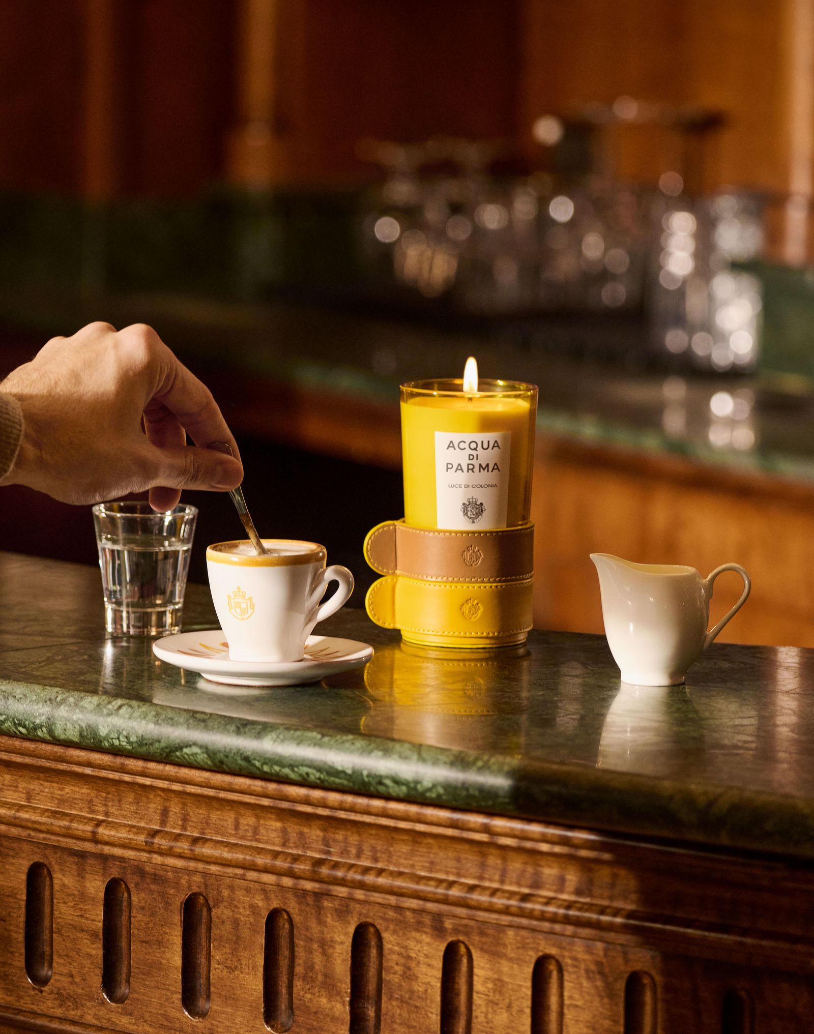 Image may contain coffee cup, drink, coffee mug, cooking food, pouring food and candles