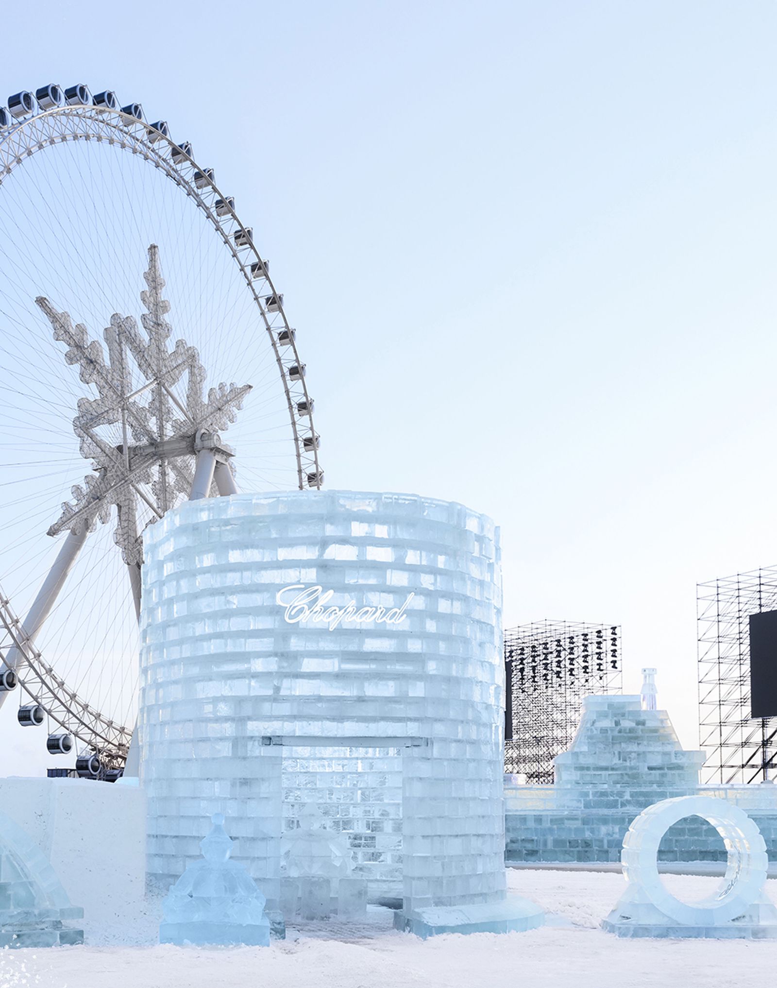 Image may contain outdoor nature amusement park fun snow and ferris wheel