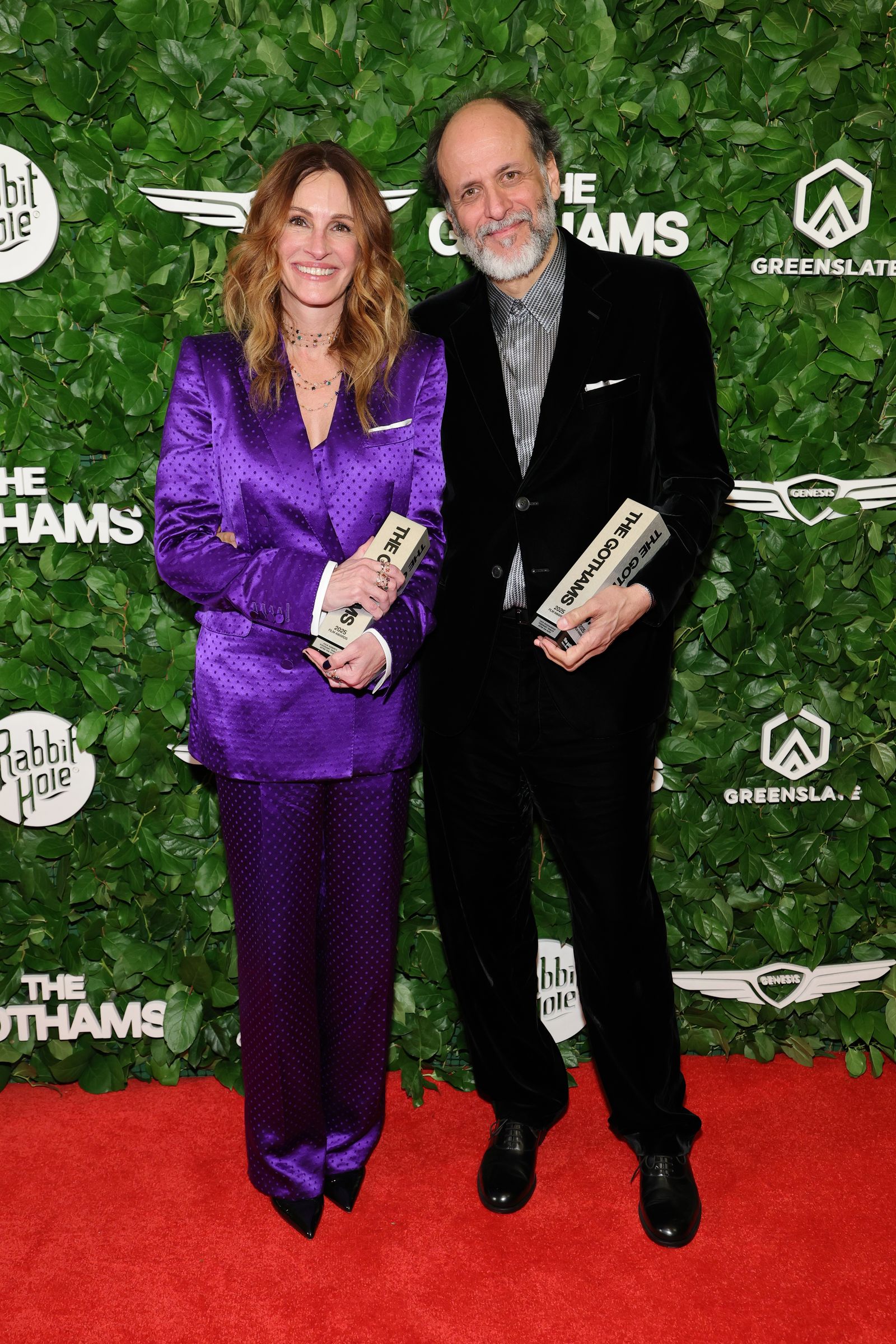 Image may contain Luca Guadagnino Julia Roberts Fashion Adult Clothing Formal Blazer and Premiere