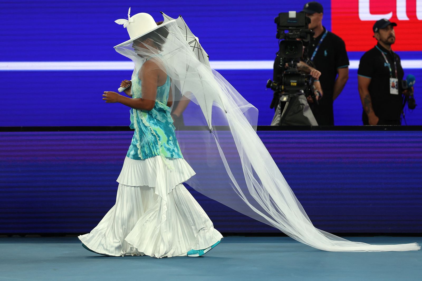 Image may contain photography, performers, solo performances, adult weddings, bridal veils, costumes and dresses