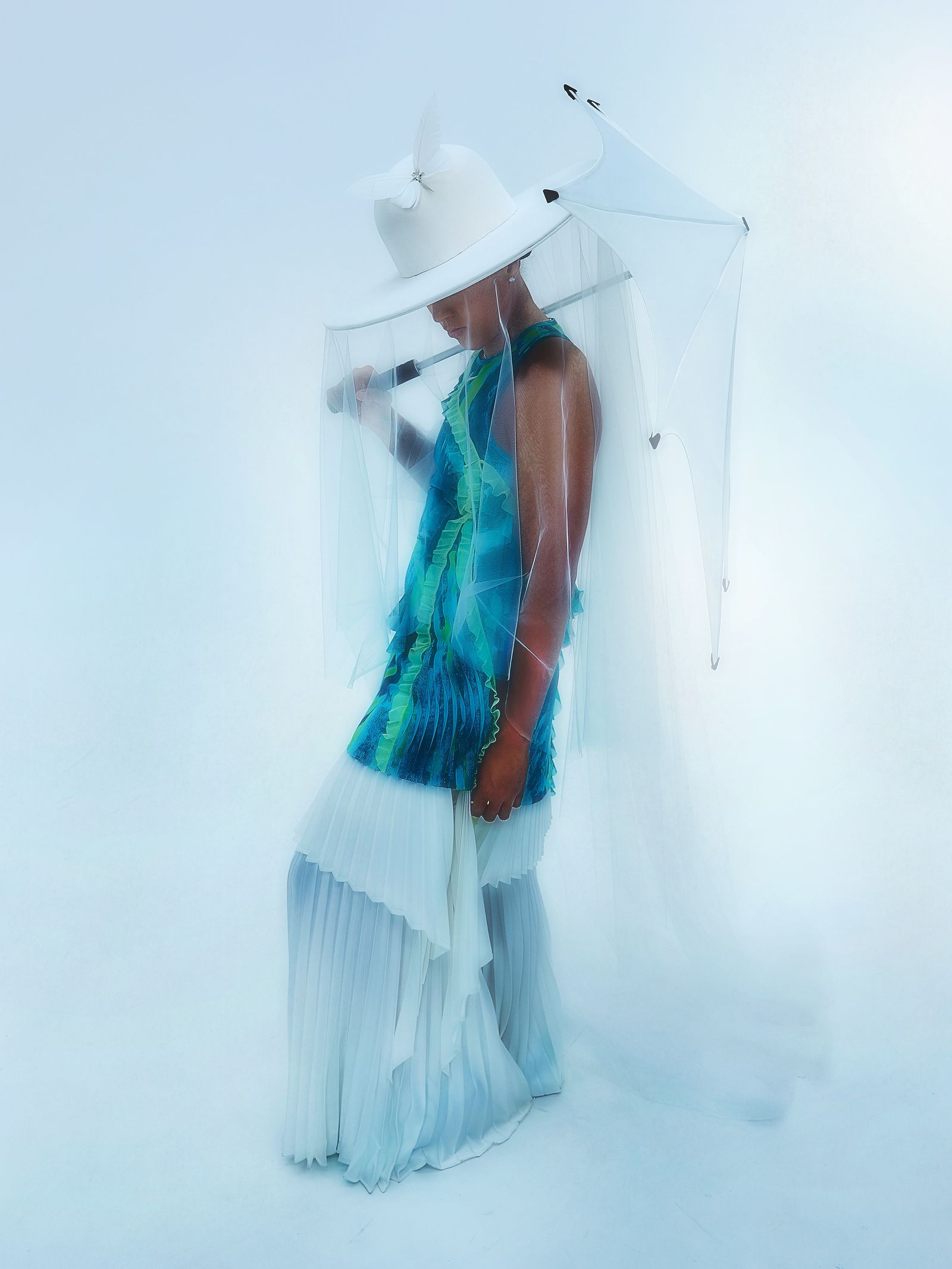 Images may contain clothing, hats, beachwear, adult faces, head photography and portraits