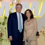 Portrait of Leon and Debra Black in front of the large