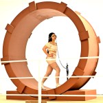 A woman wearing headphones walks on a spinning wheel.
