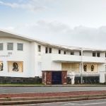 A gallery next to a road.