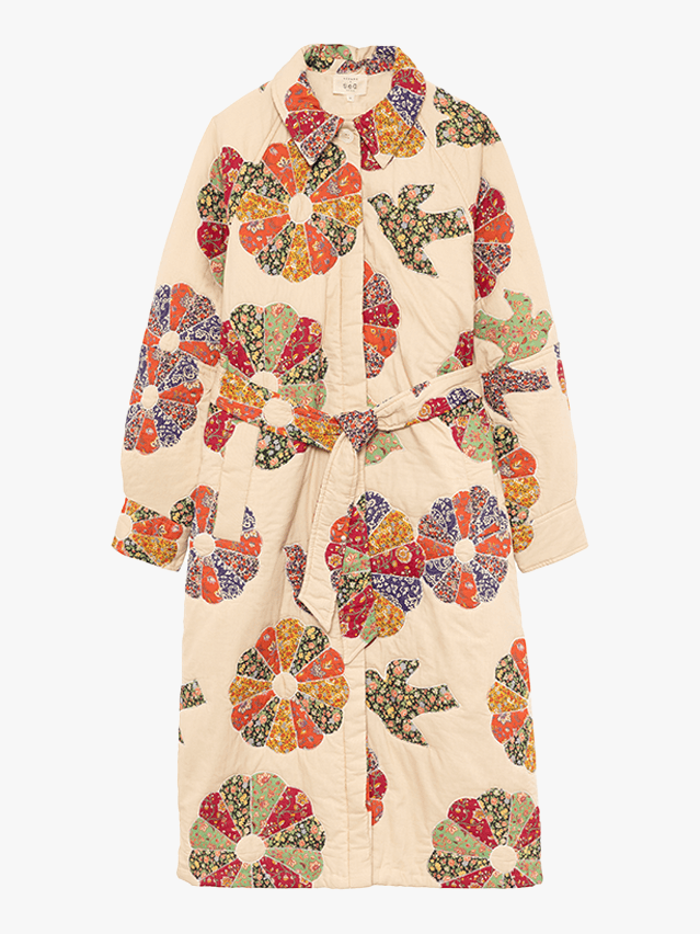 Image may contain: fashion, clothing, dress, coat, robe, formal wear and gown