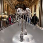 PARIS, FRANCE - OCTOBER 21: A collection of luxury jewelry including Queen Eugenie's crown and large corset bow are on display at the Louvre Museum on October 21, 2023 in Paris, France. The Louvre in Paris will reopen to visitors on October 22, 2025, three days after thieves stole some 88 million euros ($102 million) worth of jewelry in a daring daylight robbery, the museum said on its website. (Photo by Zhang Mingming/VCG from Getty Images)