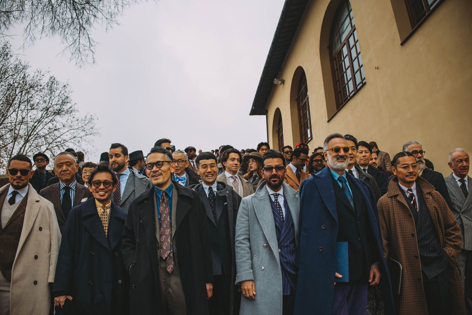 Image may contain CarryMinati Toku Nishio Clothing Coat People Formal Suits Adult Blazers and Jackets