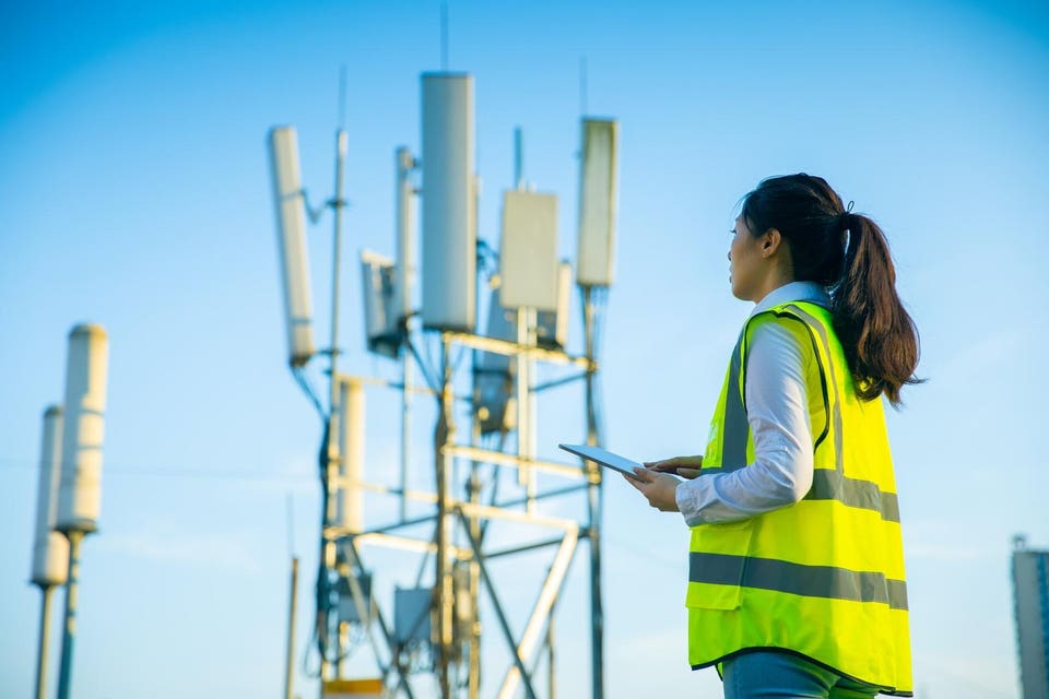 Engineer working on telecommunications tower